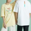 Camiseta deportiva de cuello redondo y manga corta con estampado, color amarillo claro