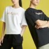 Camiseta deportiva de punto holgada de manga corta con estampado Converse para hombre, color blanco