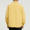 Chaqueta retro de manga larga con botones y tejido casual para hombre de Converse, color dorado