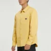 Chaqueta retro de manga larga con botones y tejido casual para hombre de Converse, color dorado