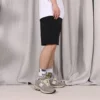 Pantalón corto de felpa de ajuste estándar con estrella bordada y diseño en forma de V, tallas asiáticas «Negro»