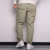 Pantalones informales de hombre Converse de color liso, tejido y corte recto, gris claro y verde