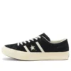 Zapatillas bajas unisex de ante con estrellas y rayas, color negro
